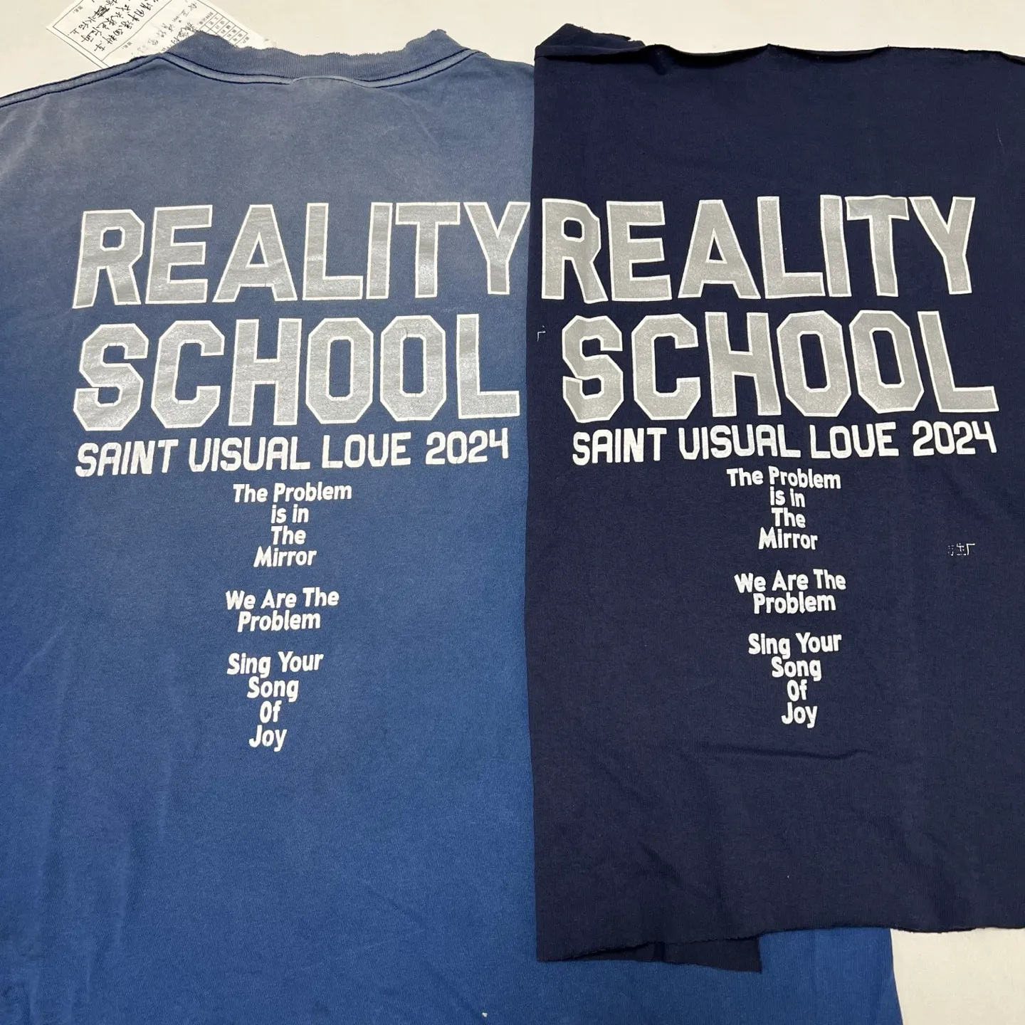 Printing proofing SAINT Mxxxxxx REALITY SCHOOL SS_TEE/NVY Slogan distressed short-sleeves Washed blue S-XL Garment dyeing Ma Liu fading Super complex shearing and destruction treatment Correct version Cylindrical fabric Customized original consistent main mark/wash mark Original consistent silver powder printing Distressed treatment